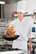 Chef Tossing Vegetables in Wok