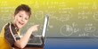 Young boy with laptop computer.