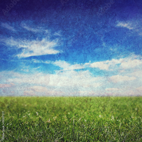 Photo: grunge sky and grass grunge sky and grass