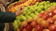 Choosing Green Apples at Organic Grocery store