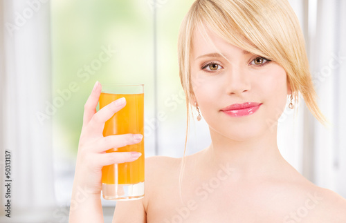 Photo: girl with a glass of juice girl with a glass of juice