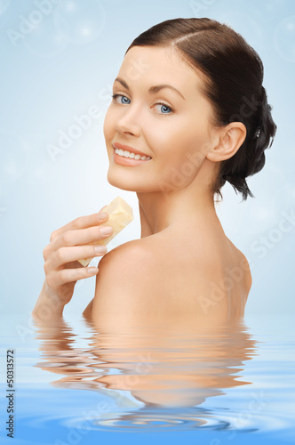 Photo: woman with soap in water woman with soap in water