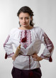 Resolute Ukrainian girl with a rolling pin