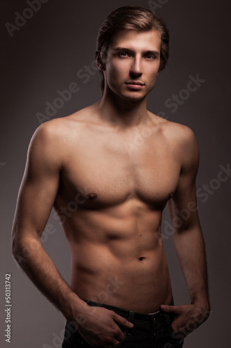 Photo: Handsome young man with naked torso Handsome young man with naked torso