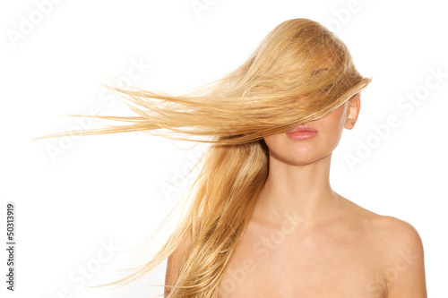 Photo: Beautiful blond with fluttering hair Beautiful blond with fluttering hair