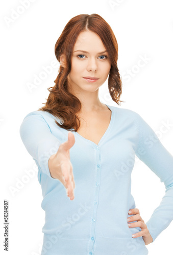 Photo: woman with an open hand ready for handshake woman with an open hand ready for handshake