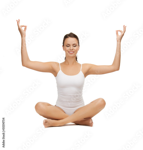 Photo: young woman doing exercises, yoga, pilates young woman doing exercises, yoga, pilates