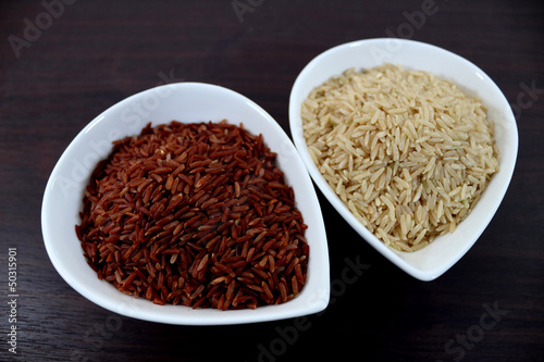 Photo: Red and brown rice in bowls Red and brown rice in bowls