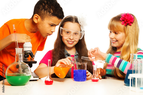Photo: Three kids and chemistry lab Three kids and chemistry lab