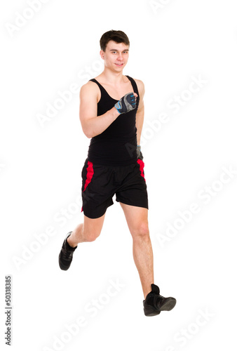 Photo: male athlete running isolated on white background male athlete running isolated on white background