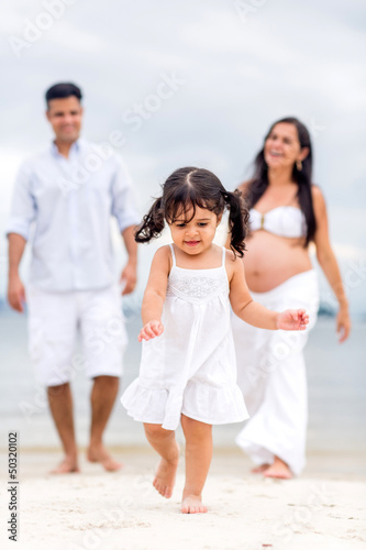Photo: Happy family at the beach Happy family at the beach