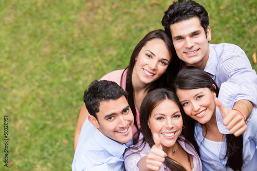 Photo: Group of people with thumbs up Group of people with thumbs up