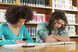 Photo: Students at library Students at library