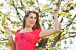 Girl in spring and tree blossom