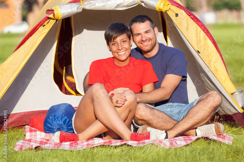 Photo: Young Couple Camping on Summer Young Couple Camping on Summer