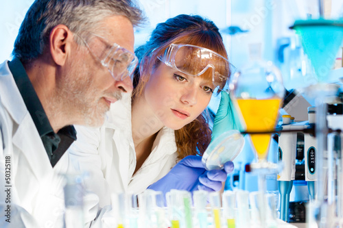 Photo: Health care professionals in lab. Health care professionals in lab.