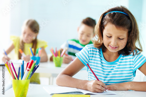 Photo: Girl drawing Girl drawing