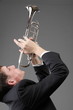 Portrait of a young man playing his Trumpet