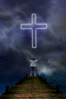 Praying man before a cross