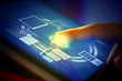 Closeup of finger touching tablet-pc screen