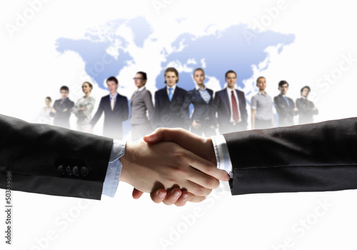 Photo: image of business handshake image of business handshake
