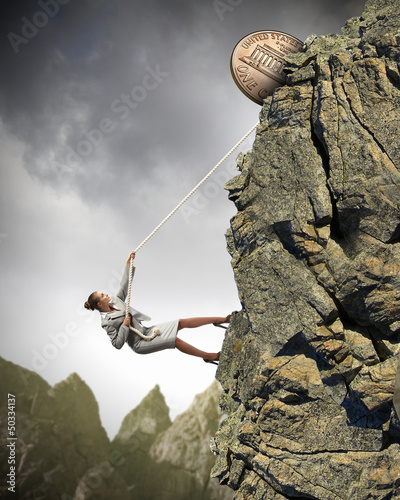Photo: businesswoman climbing mountain businesswoman climbing mountain