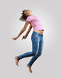 young woman dancing and jumping