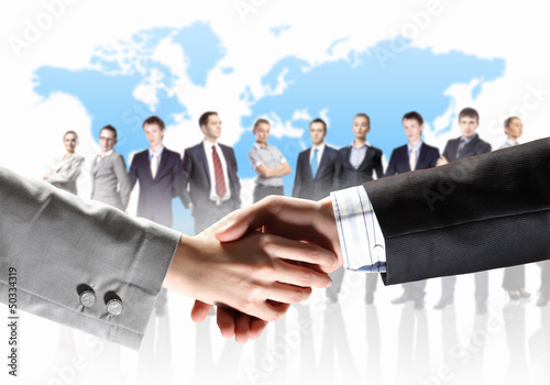 Photo: image of business handshake image of business handshake