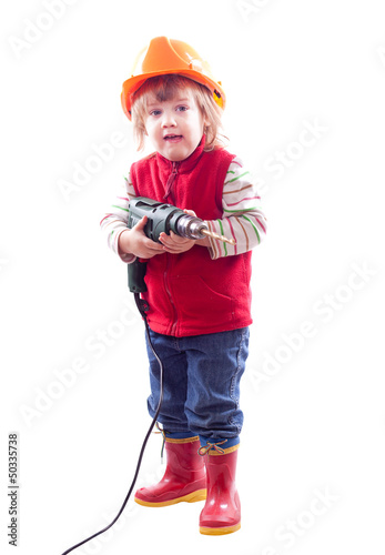 Photo: baby in hardhat with drill. baby in hardhat with drill.
