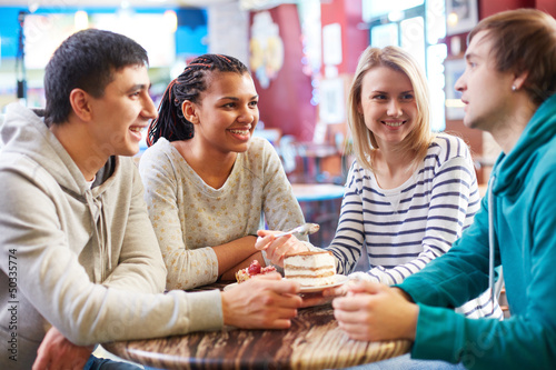 Photo: Friends in cafe Friends in cafe
