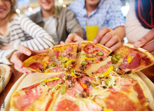 Photo: Taking pizza Taking pizza