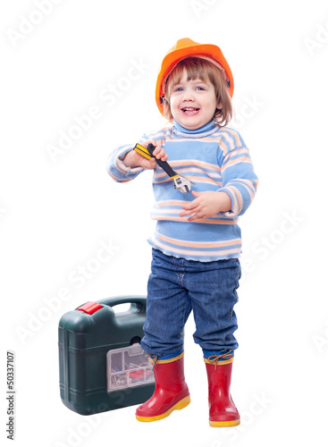 Photo: Happy baby in hardhat with tools Happy baby in hardhat with tools