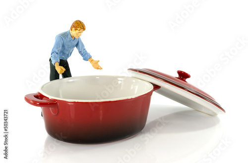 Photo: puppet looking in empty saucepan puppet looking in empty saucepan