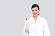 Photo: Ärztin mit Blutprobe in der Spritze Ärztin mit Blutprobe in der Spritze