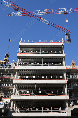 Photo: two cranes in blue sky two cranes in blue sky