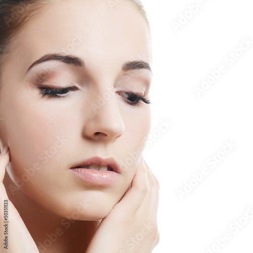 Photo: beautiful woman with a natural make-up. Care of a skin. Spa beautiful woman with a natural make-up. Care of a skin. Spa