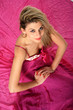 Photo: blond girl with pink dress blond girl with pink dress