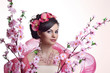 Brunette beautiful woman with flowers