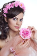 Brunette beautiful woman with flowers