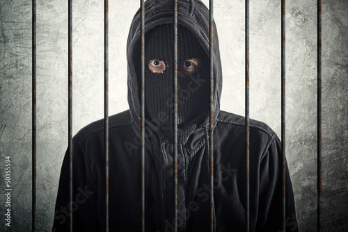 Photo: Arrested burglar behind bars Arrested burglar behind bars