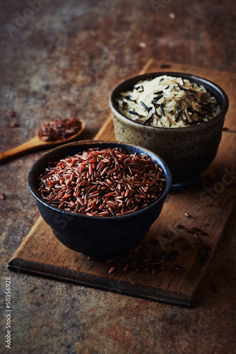 Photo: Different types of rice in ceramic bowls Different types of rice in ceramic bowls