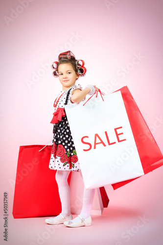 Photo: girl with bags girl with bags