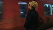 woman waiting subway on the station, Steadicam shoot