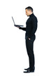 Isolated young business man with notebook