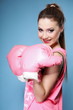 Female boxer model with big fun pink gloves