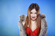 sexy woman in fur coat and red bra