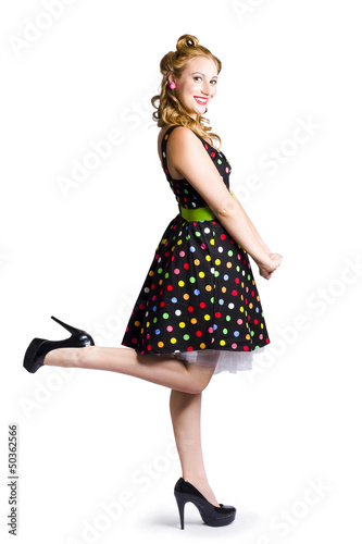 Photo: Happy woman in retro dress Happy woman in retro dress