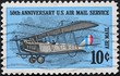 old airmail stamp with biplane