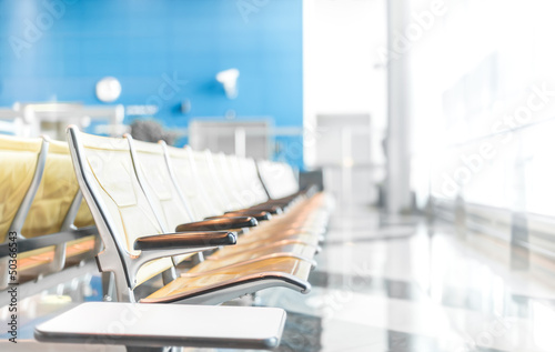 Photo: Seats in airport hall waiting for passengers. Seats in airport hall waiting for passengers.