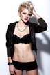glamor sexy stylish blond model in black cloth with short hair